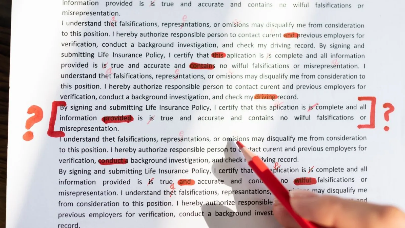A hand marking a printed form with a red pencil, errors circled and question marks in the margin.